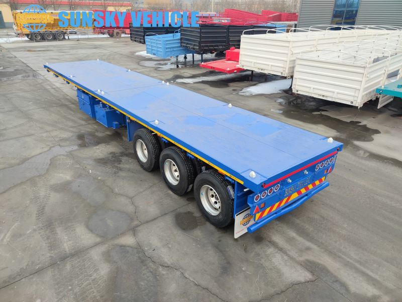 The 40ft drop deck trailer will delivered to Tanzania