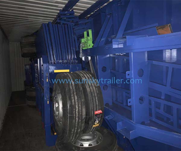 SIDE WALL TRAILER LOAD INTO CONTAINER